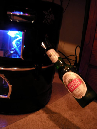 Illustration for article titled Naturally, This Beer Keg Casemod Has a Bottle Opener